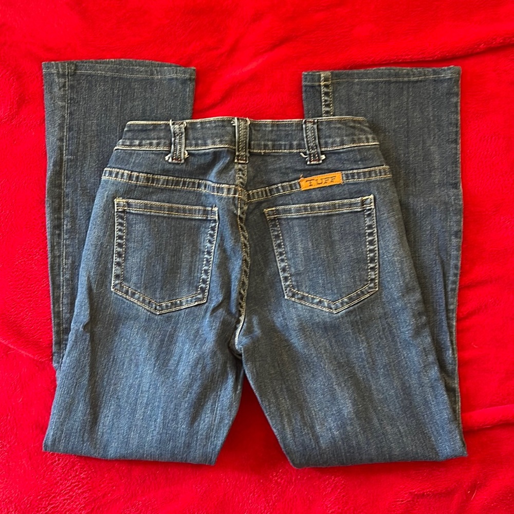 Pair of cowgirl tuff jeans size 27 x 33